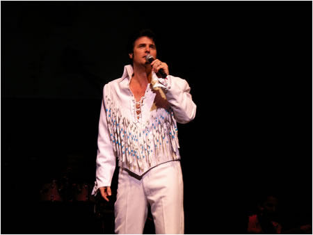 Chris MacDonald in the 1970's Elvis in Concert White Fringe outfit Chris MacDonald in the 1970's Elvis in Concert White Fringe look